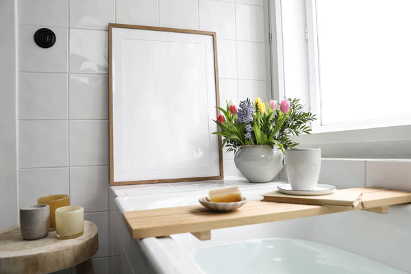 A bathroom's tub, featuring soft white paint, elegant decor, and refined hardware near North Attleborough, MA